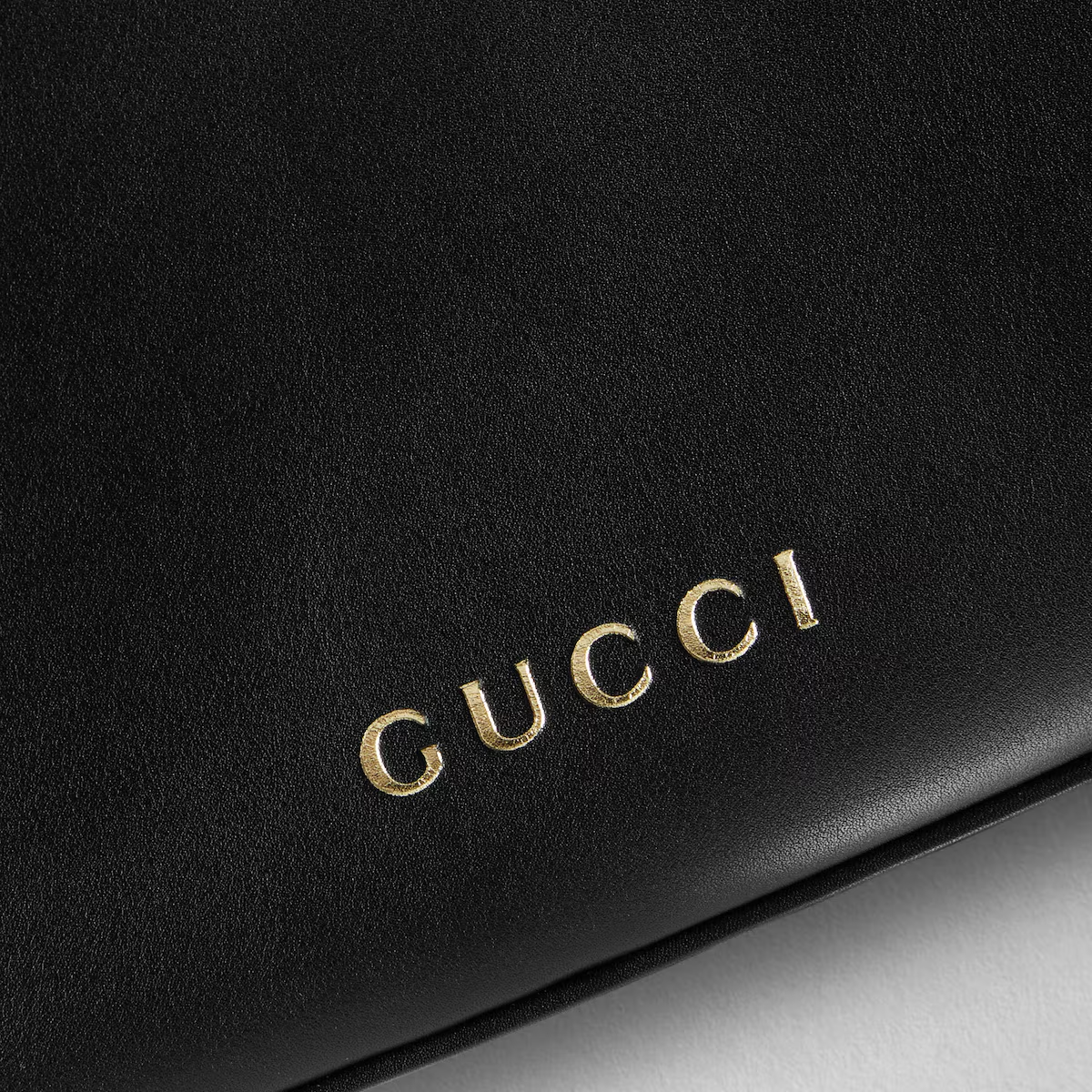 GG EMBLEM MINI BUCKET BAG